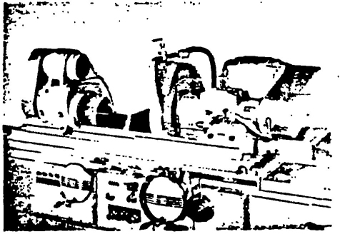 ILLUSTRATION No. 49 A Cylindrical grinding machine employing a well-designed guard.